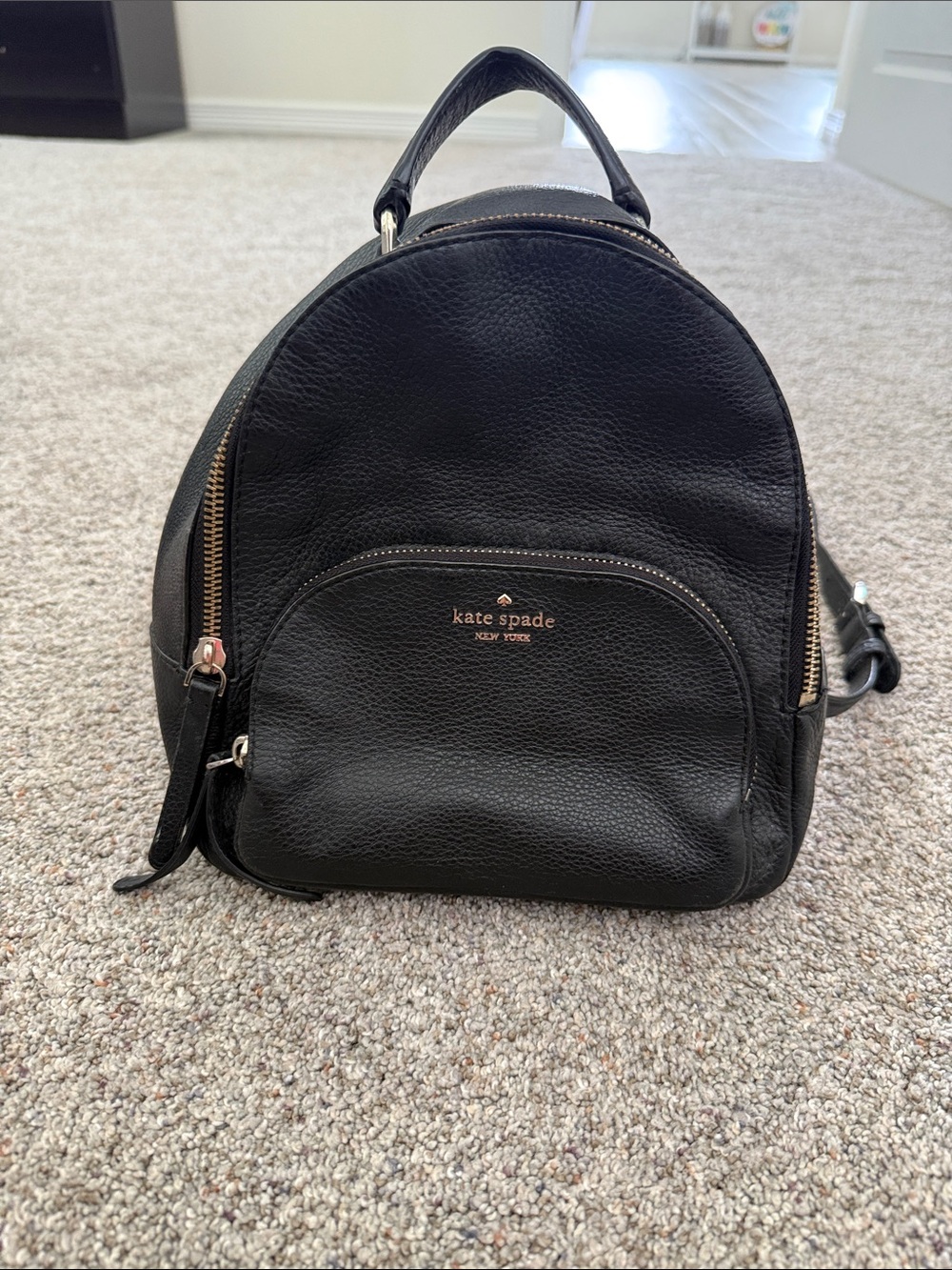 Kate Spade Jackson Medium Backpack black pebbled leather gold hardware